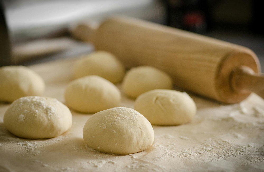 Dough balls and a rolling pin